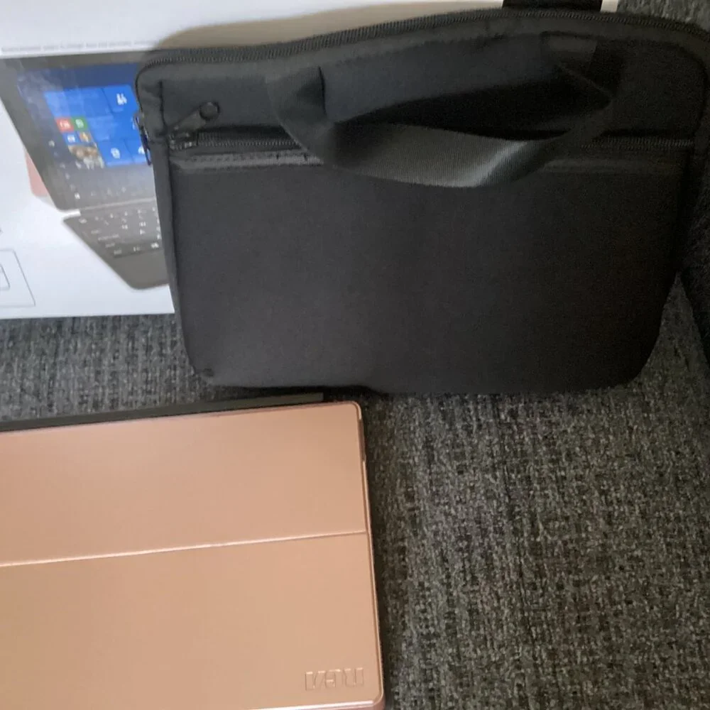 New RCA 2-in-1 Notebook/tablet w/keyboard & head phone